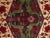Hand-knotted wool rug on cotton warp. Beautiful bird rug motif dominated by peacocks in the center of the rug. There are...