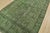 An authentic vintage traditional overdyed Tabriz rug hand-knotted with fine wool on a cotton foundation. This rug features...