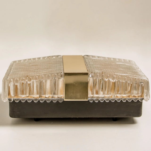 Pair of wonderful stylish textured glass wall lights from Limburg Glashütte produced. This piece is attributed to the...