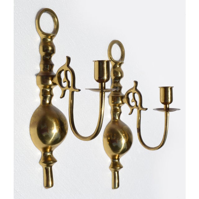 Pair of Neoclassical French Maison Jansen Style wall-mounted Cast Brass Candle Sconces, Wall Hurricane Lamps. Each sconce...