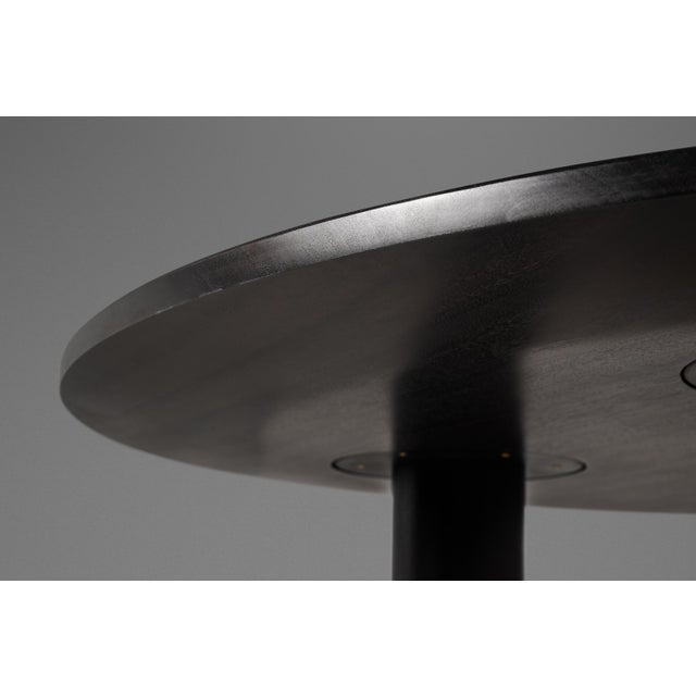 Introduce your home to a touch of organic elegance with this one-of-a-kind dining table by Mark LeBlanc. Masterfully...