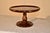 19th century mahogany pedestal from England. The top has a pie crust edge surrounding the top, which is supported on a...