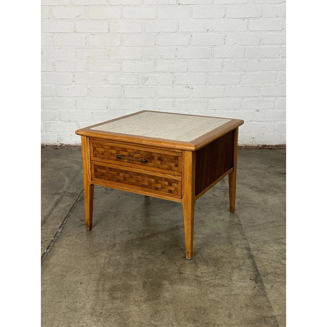 W24 D24 H20 Vintage side table by lane in fully restored condition. Item has a nice travertine surface, caned front, and a...