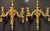 Large and impressive carved and gilt wood 3- arm wall sconces in the Louis XVI style. Urn and flame for top with tassels...