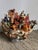 A whimsical ceramic hand-painted Noah's Ark by Fitz & Floyd, large scale at 17" tall with colorful animals poking out of...