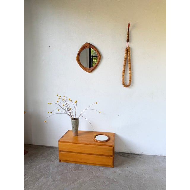 Vintage free-form mirror in the French Riviera style, by Tito Agnoli, from the 1970s. We love the unique shape, the...