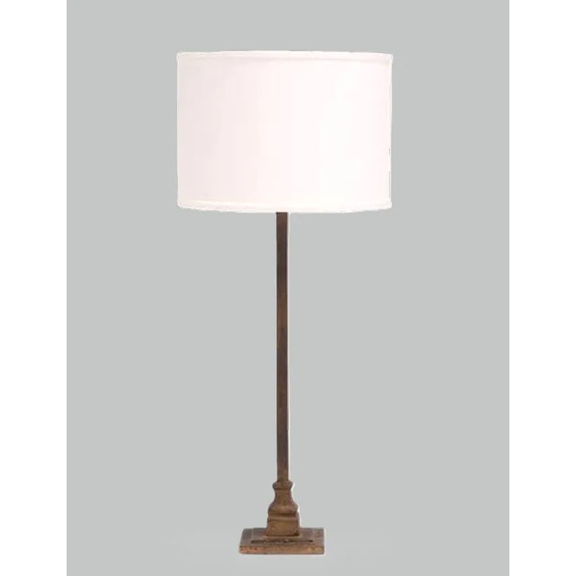 A showroom pair of striking vintage Palecek Ridge Metal Table Lamps from NYC. Featuring solid cast iron bases and bodies...