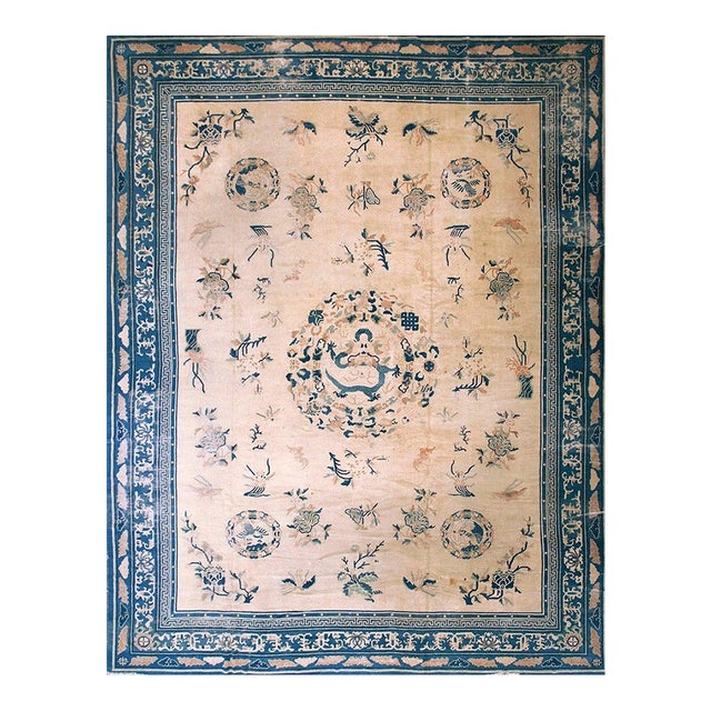 Sensational Beige Background Color and Royal Blue Border Intricate Details of Dragon in a Chinoiserie Pattern Antique Chinese Peking Rug For Sale