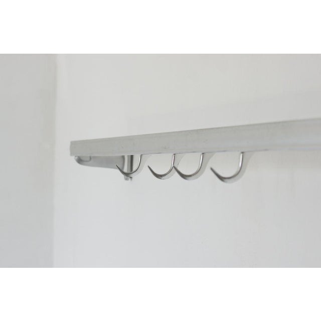 An original industrial meat hook from the 1960s, made of solid aluminum. This unusual object comes from a former butcher's...