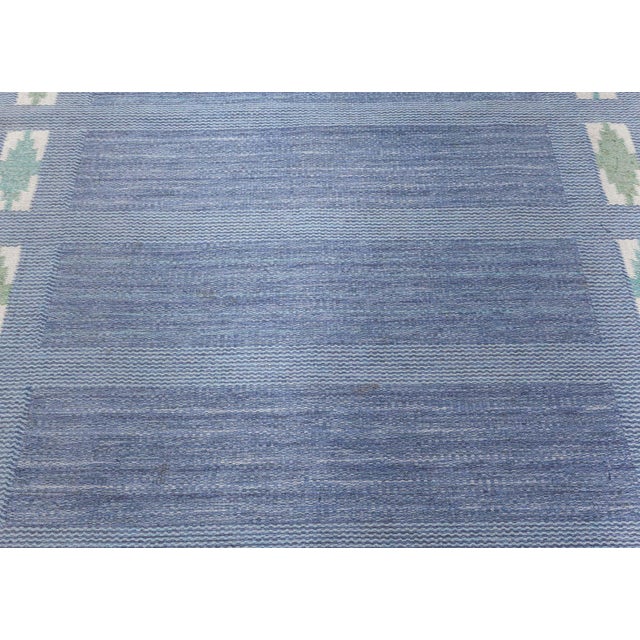 Vintage Swedish Flat Woven by Ulla Parkdal Size: 5'5" × 8'0" (165 × 243 cm) This vintage Swedish flat-woven rug, designed...