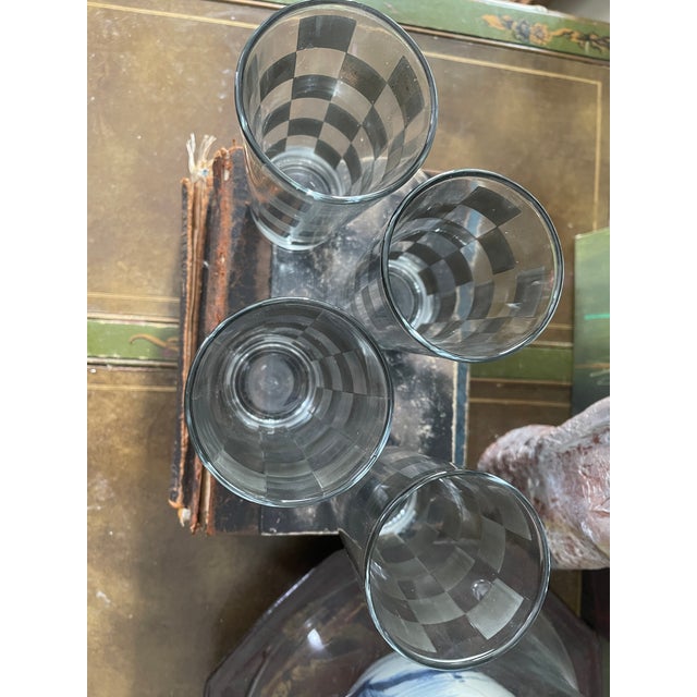 Wonderful, vintage glassware, presented as a tall, slender glass with a silver checkered pattern. The checkered pattern...