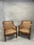 An impressive and beautifully designed pair of vintage Swedish neoclassical style armchairs. The timeless frames are...