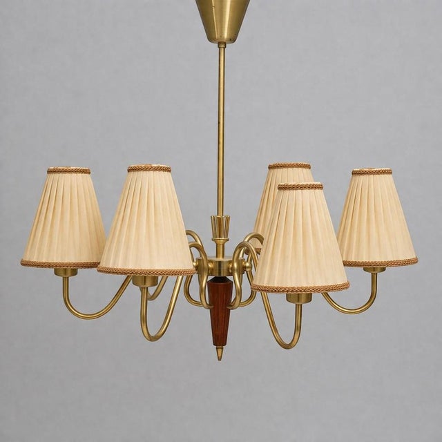 Elegant swedish modern chandelier attributed to hans bergström for asea, dating from the 1940s. This refined ceiling lamp...