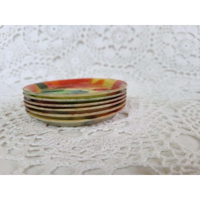 Mod floral plastic coasters, perfect for indoor or outdoor dining. This set of 6 is in excellent vintage condition and...