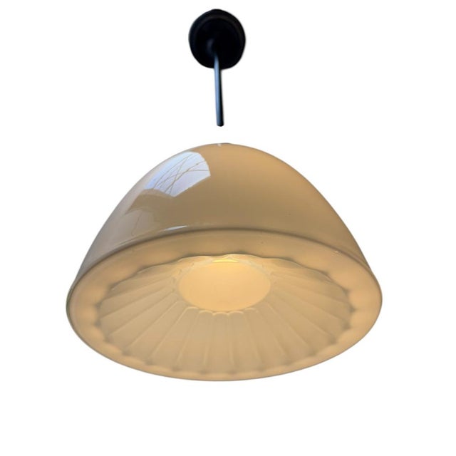 Stunning and elegant Art Nouveau pendant lamp. Striking German design from the 1900s. Original patinated brass ceiling...