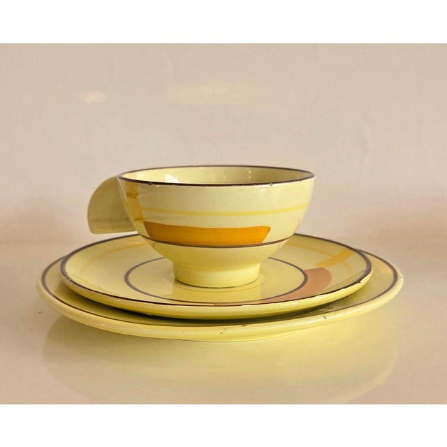 Constructivist, linear design. interesting cup: hemisphere on a cylindrical base, handle shaped like a disc segment....