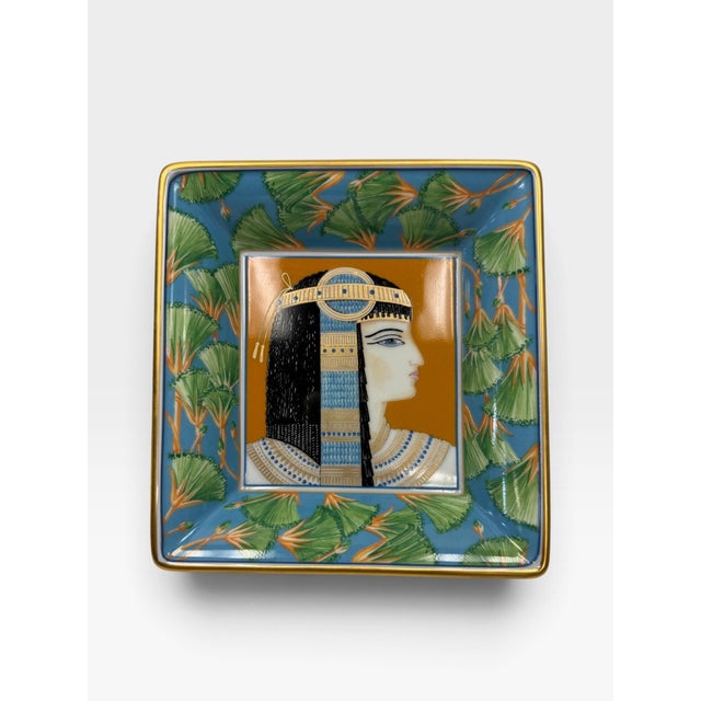 Infuse your home styling with the timeless mystique of the Nile with this luxurious porcelain vide-poche tray by the...