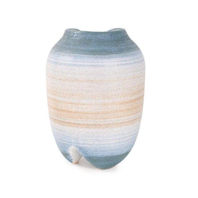 Organic and artistic, this sculptural vase offers a rounded body and split top detail for a modern, handcrafted look. The...