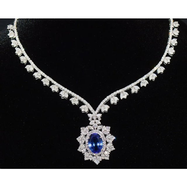 GIA certified natural 18K solid gold 26.89CTS diamond and tanzanite investment grade necklace. This is a custom made top...