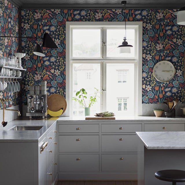 A dense flora-and-fauna pattern brimming with whimsical details, Boråstapeter’s Trädgården wallpaper has a retro charm...