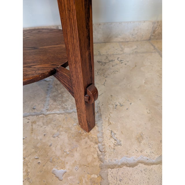 This Mission Style Lamp Table blends timeless craftsmanship with the rugged honesty of the Arts and Crafts movement. It is...