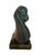 A striking mid-century modern abstract bronze sculpture depicting a graceful draped female figure in a minimalist, flowing...