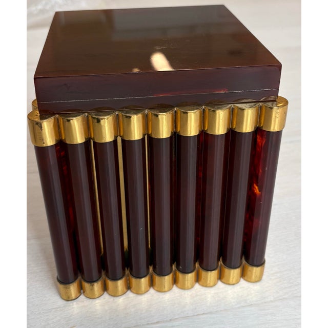 Gabriella Crespi (Italian 1922-2017) resin cylindrical box with polished brass end caps, 1970's. "Gabriella Crespi"...