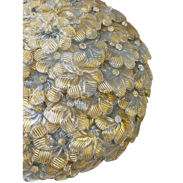 Prestigious ceiling lamp produced in Murano in the 1960s, attributed to Seguso Vetri d'Arte. It features a white painted...
