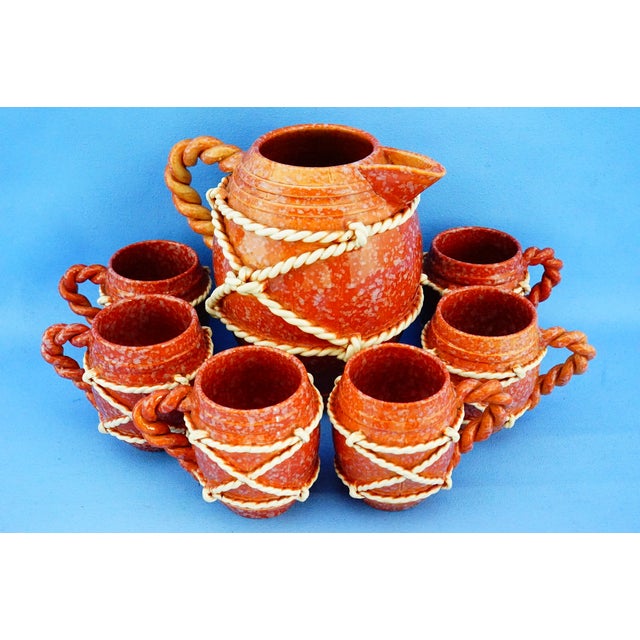 Measurements: jug: height: 20 cm; width: 23 cm; depth: 19 cm glass: height: 9.5 cm; width: 12 cm; depth: 9 cm total...