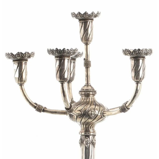 Pair of portuguese five-light silver candlesticks 19th century neo-manueline-inspired work, decorated with windings,...