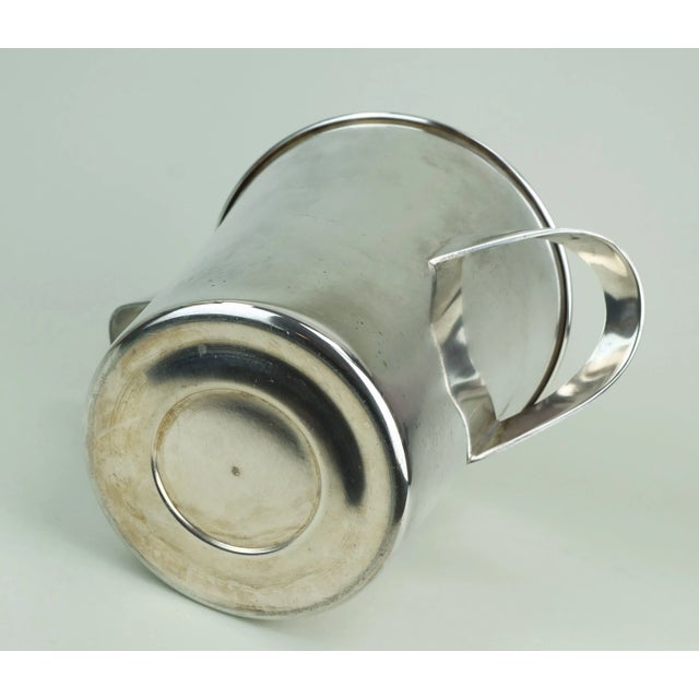 Elegant vintage champagne cooler manufactured by WMF. Designed by Kurt Mayer. Silver-plated metal. Signed to bottom WMF....