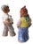 Pair of rare Art Deco period glazed terracotta figurines depicting a boy and a girl. The boy is known as The Shoemaker, or...