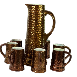 1930s Handcrafted, Artisan – Ceramic Large, Pitcher, and Eight Tankards-in a Hammered Copper Lusterware Finish - Set of 9
