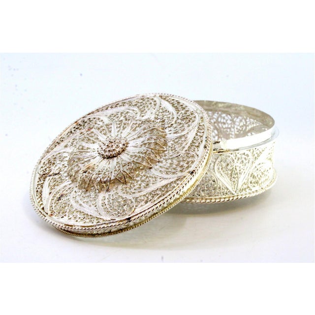 Filigree Silver Box with Reliefs and Cutouts, in Very Good conditions. Designed from 2000 This piece has an attribution...