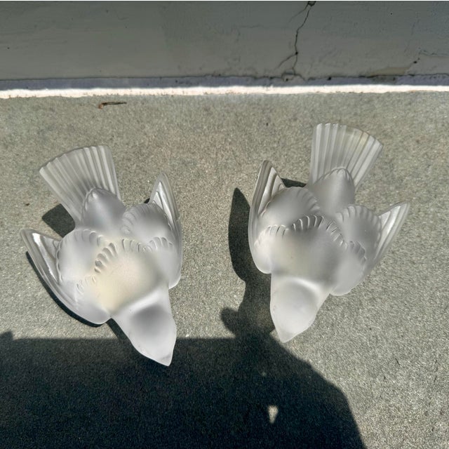 Elevate your décor with this exquisite set of four Lalique frosted crystal sparrow birds, each sculpted with lifelike...