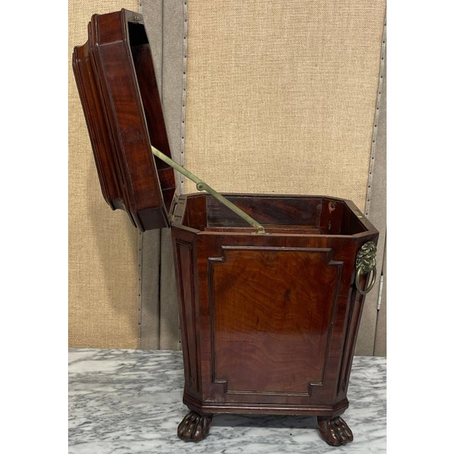 Diminutive Regency Mahogany and Brass Cellarette, Attributed to Gillows & Co. England, circa 1820 A rare and unusual...