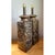 This pair of vintage ceramic lamps brings mid-century modern character to any space through abstract carved relief work....