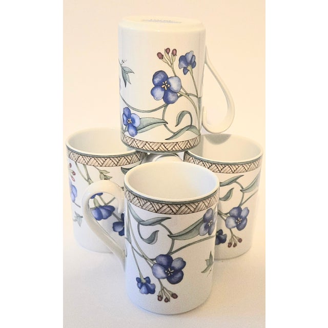 These gorgeous floral mugs feature vivid blue sweet- pea-esque flowers. I have other matching pieces of this design listed...