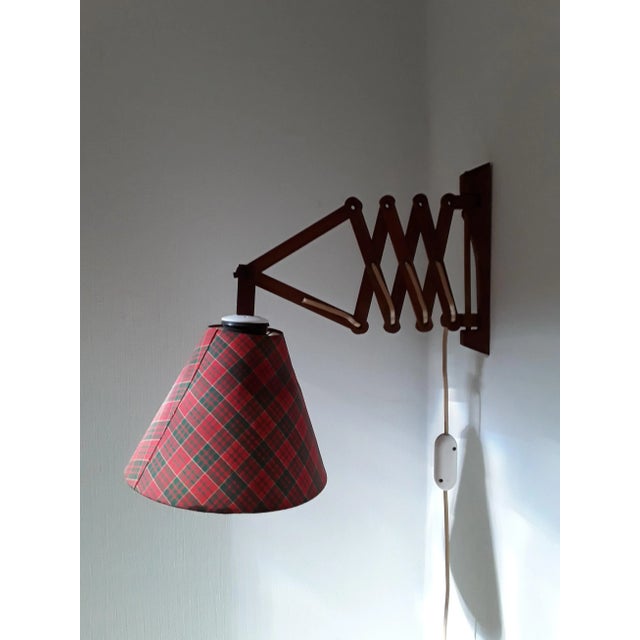 Vintage Fabric and Teak Sconce, 1970s, in Good conditions. Designed 1970 to 1979 European Plug (up to 250V).The wiring of...