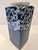This elegant Japanese porcelain vase features a striking indigo‑blue and white design of soaring cranes above a stylized...