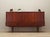 The highboard was made in the 1960s, Danish production. The structure is covered with teak veneer. The legs are made of...
