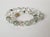We are excited to present our newest addition to the collection - a stunning Phantom Quartz knotted necklace. Measuring...