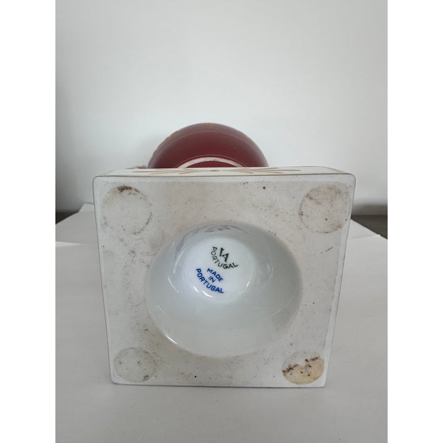 Circa 1960, lyre/harp and laurel motif. Deep red/rust color with intricate 24k gold gilt detailing. Made in Portugal....