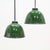 Two green and white enamel domed pendant shades resemble those made by Benjamin Industries, though no maker marks are...