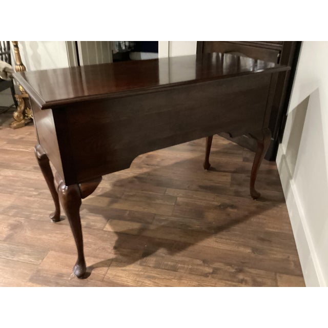 This vintage Mahogany or Cherry solid wood Chippendale Style Executive Desk is a stunning piece of furniture that exudes...