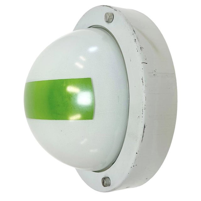 Vintage industrial emergency wall light made by Elektrosvit in former Czechoslovakia during the 1970s. It featutes a light...