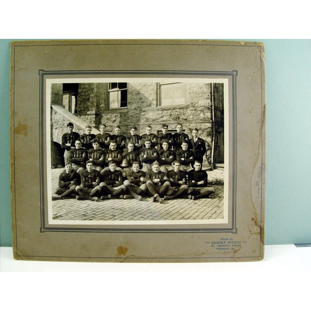 Early 20th century photograph of a college football team. Photo taken by Zamsky Studios, Philadelphia, Pennsylvania....