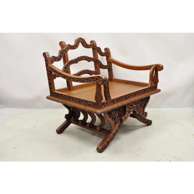 Vintage Chinoiserie Carved Teak Wood Howdah Elephant Saddle Accent Chair. Item features solid wood construction, nicely...