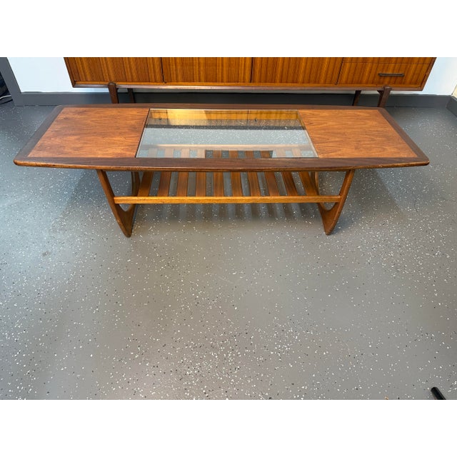 This is a vintage Danish modern style teak and glass large coffee table by British Furniture maker GPlan from their...