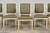 An exquisite set of eight French Louis XVI style restored dining chairs, consisting of six side chairs and two armchairs,...